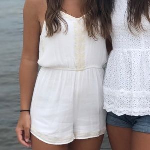 Off white romper with pattern. Size extra small
